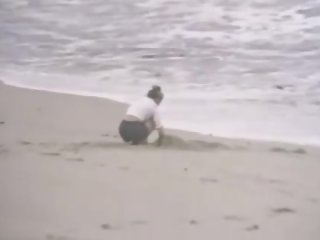 Hård tappning kön film på en strand